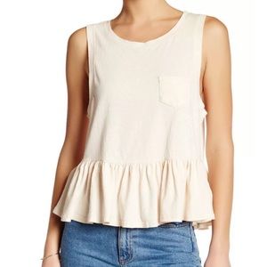 Free People relaxed distressed peplum top 🌸